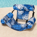 Poolora Float Chair in Poolora Blue tropical leaf print beside a swimming pool