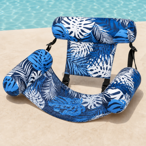 Poolora Float Chair in Poolora Blue tropical leaf print beside a swimming pool